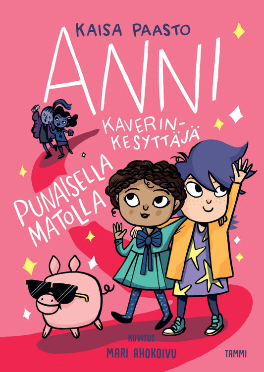 Etukansi. Kaisa Paasto. Mari Ahokoivu. Anni kaverinkesyttäjä punaisella matolla.