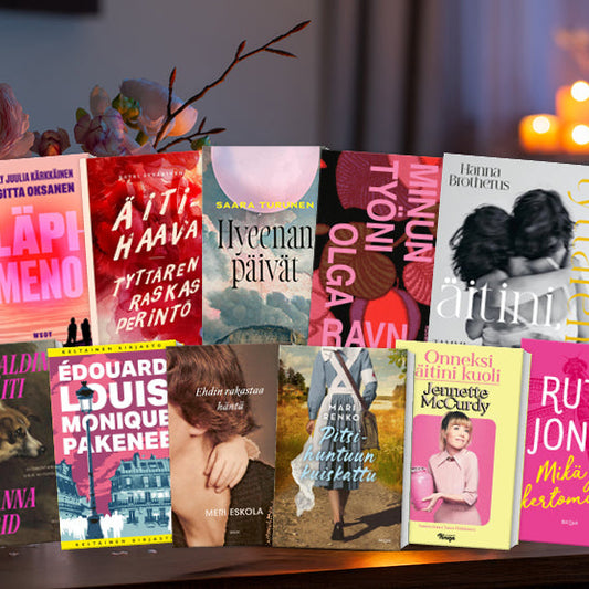 Erilaisia äitiysteemaisia kirjoja aseteltuja taustalle, josta erottuu epätarkkoina kukkakimppu ja kausivaloja,