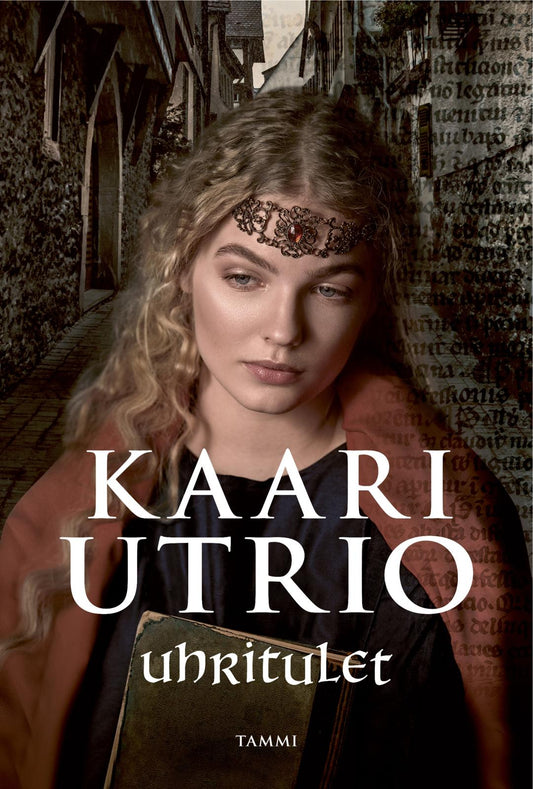 Etukansi. Kaari Utrio. Uhritulet.